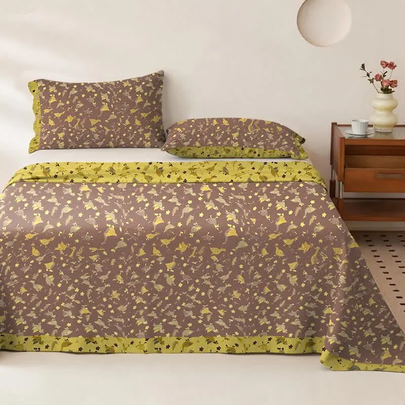 Copriletto in doppia garza di cotone con stampa floreale e motivo a papera