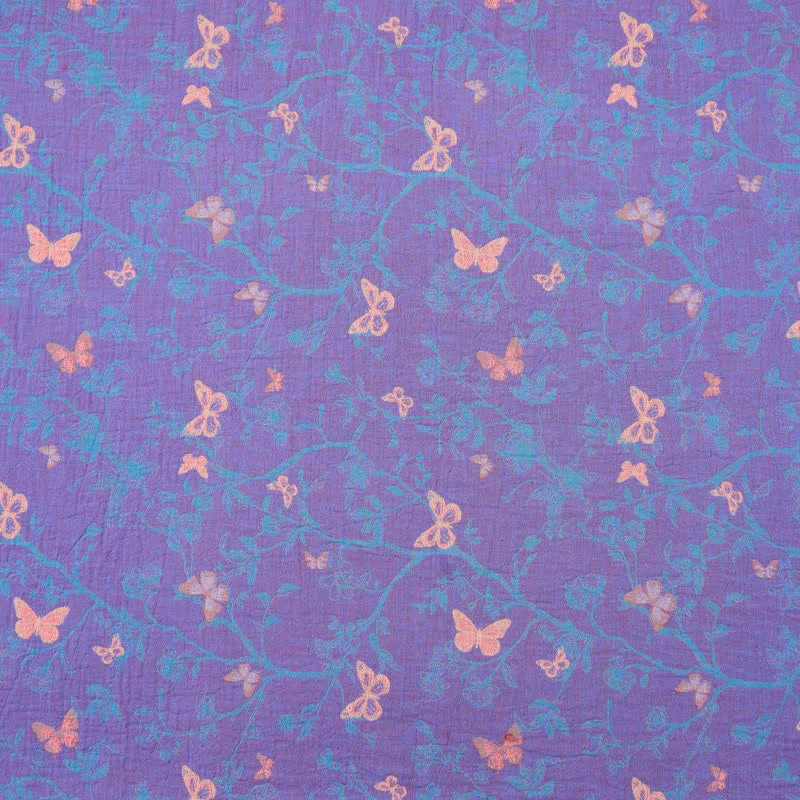 Tessuto jacquard di cotone con motivo a farfalle e viticci