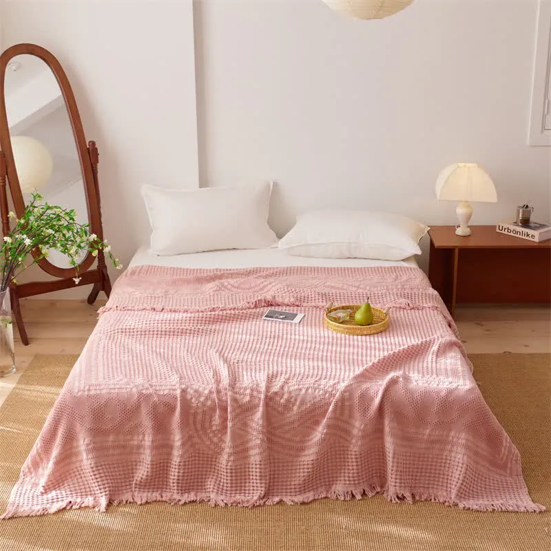 Trapunta/coperta con nappe in cotone a trama waffle
