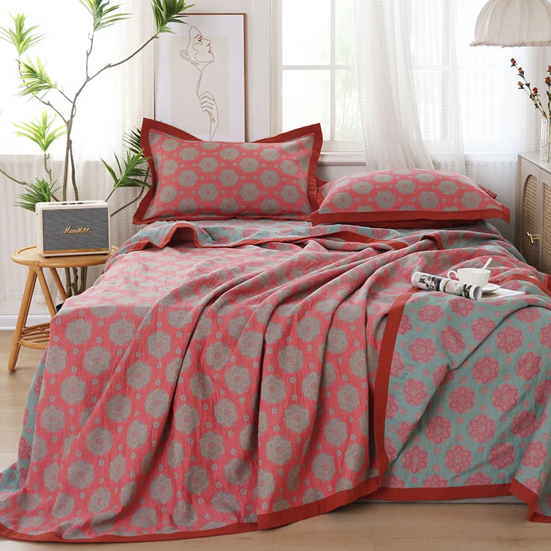 Trapunta reversibile in garza di cotone intrecciata a fiori
