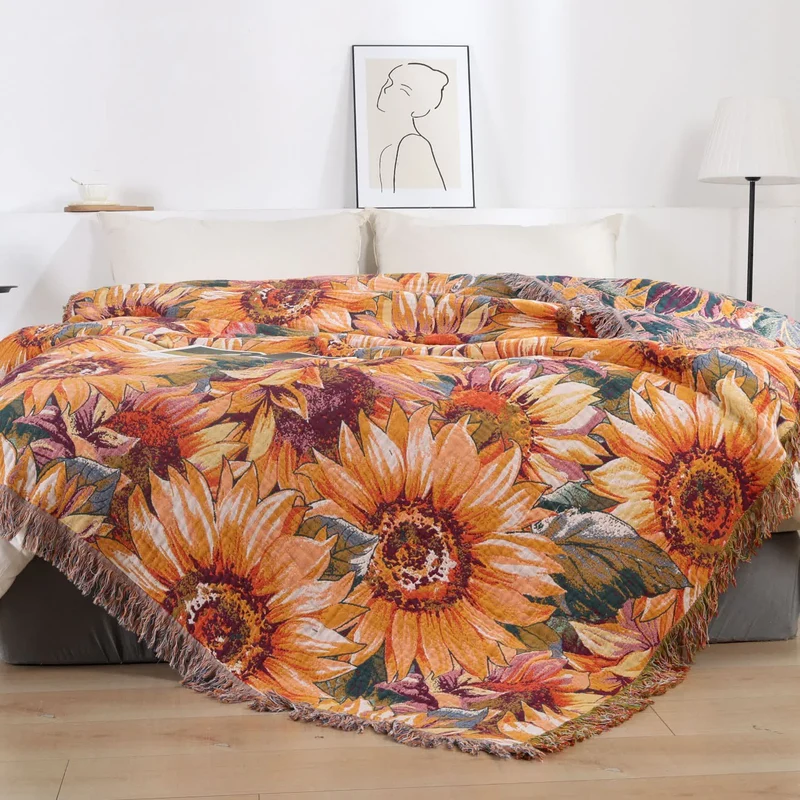 Copriletto trapuntato in garza di cotone con motivo girasoli in stile boho