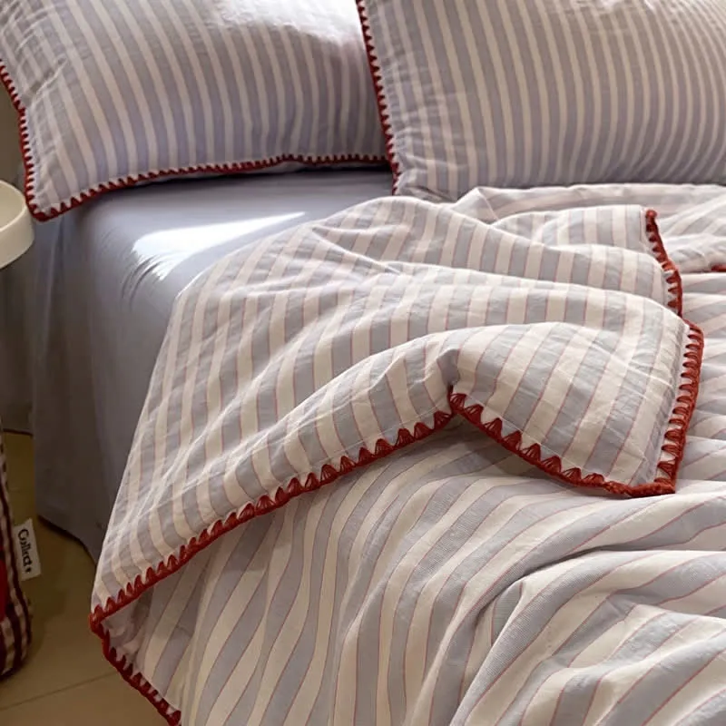 Set di biancheria da letto in cotone lavorato a maglia a righe blu