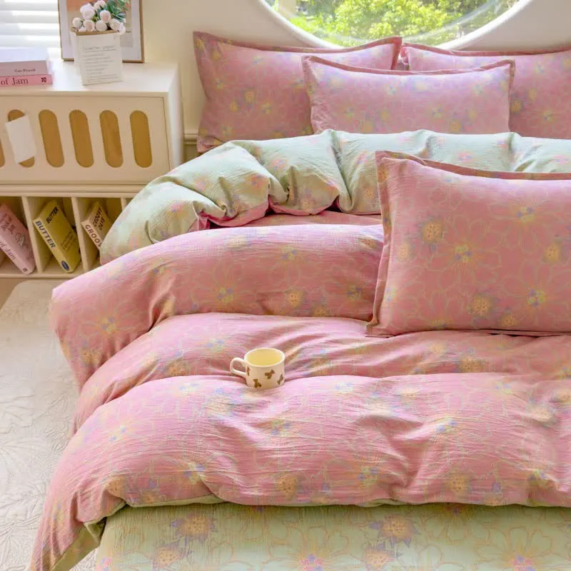Set di 4 pezzi di biancheria da letto in doppia garza di cotone con stampa floreale pastello