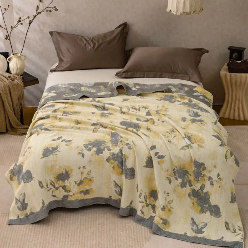 Trapunta in cotone con motivo floreale giallo e grigio