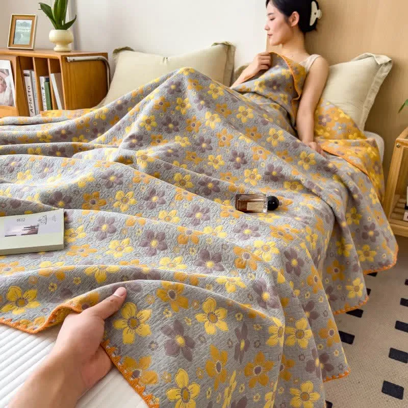 Trapunta rustica in cotone a tripla garza con motivo floreale selvatico
