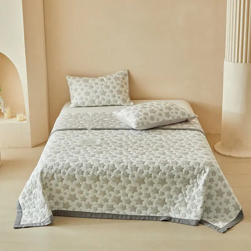 Set di trapunte reversibili con motivo a stelle neutre