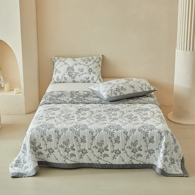 Set di trapunte reversibili con motivo rami e fiori