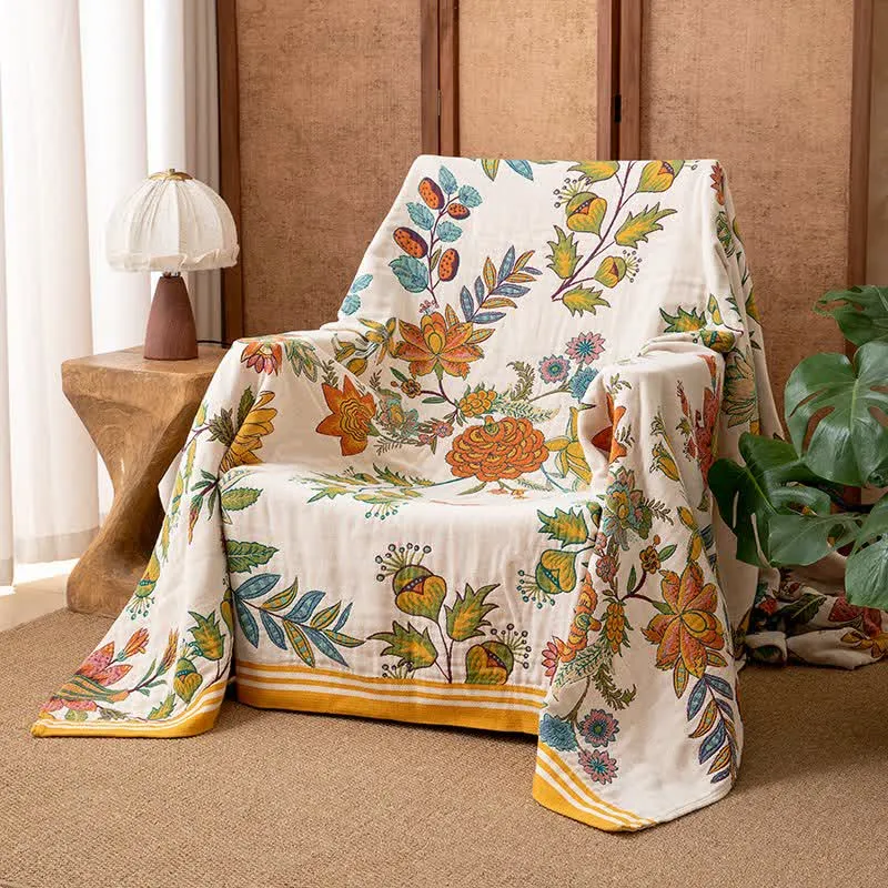 Coperta in puro cotone con motivo floreale vibrante