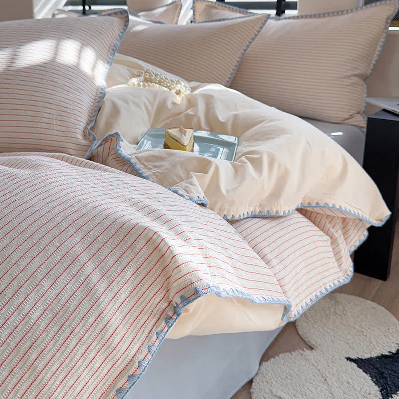 Set di biancheria da letto in cotone lavato con bordo smerlato a righe