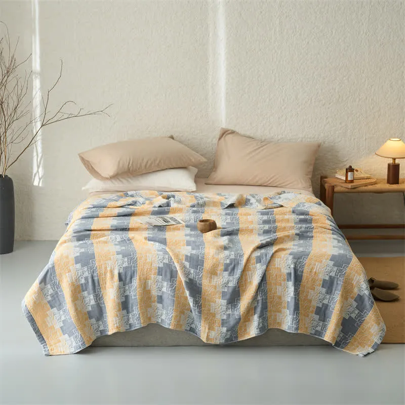 Coperta reversibile in mussola di cotone con motivi geometrici
