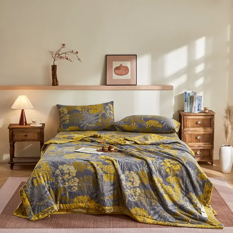 Trapunta jacquard con motivo botanico ad albero in garza di cotone