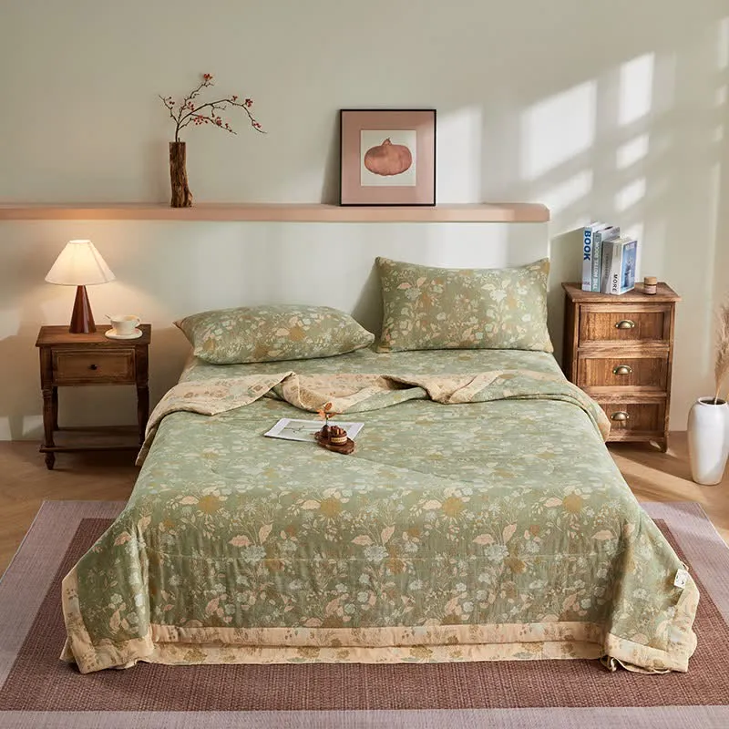 Trapunta jacquard con motivo floreale a foglie in garza di cotone