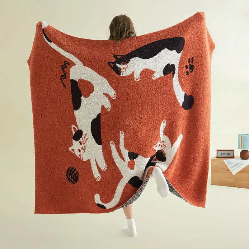 Coperta in pile lavorato a maglia con gatti giocosi