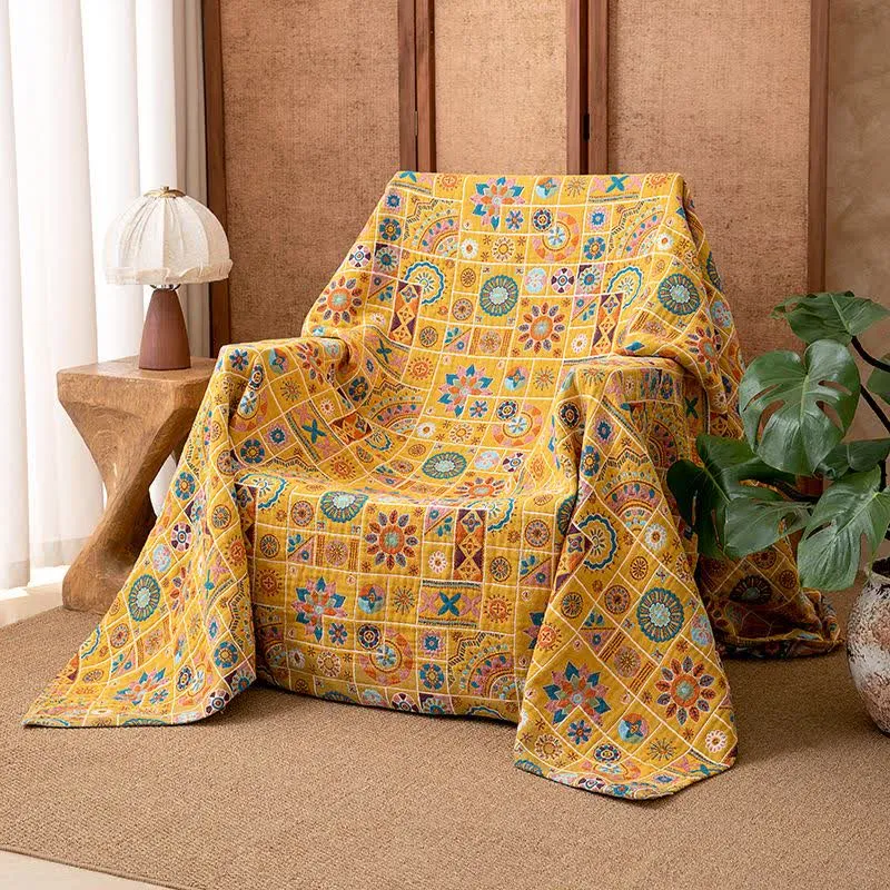 Coperta in garza di cotone a quadri con motivo geometrico