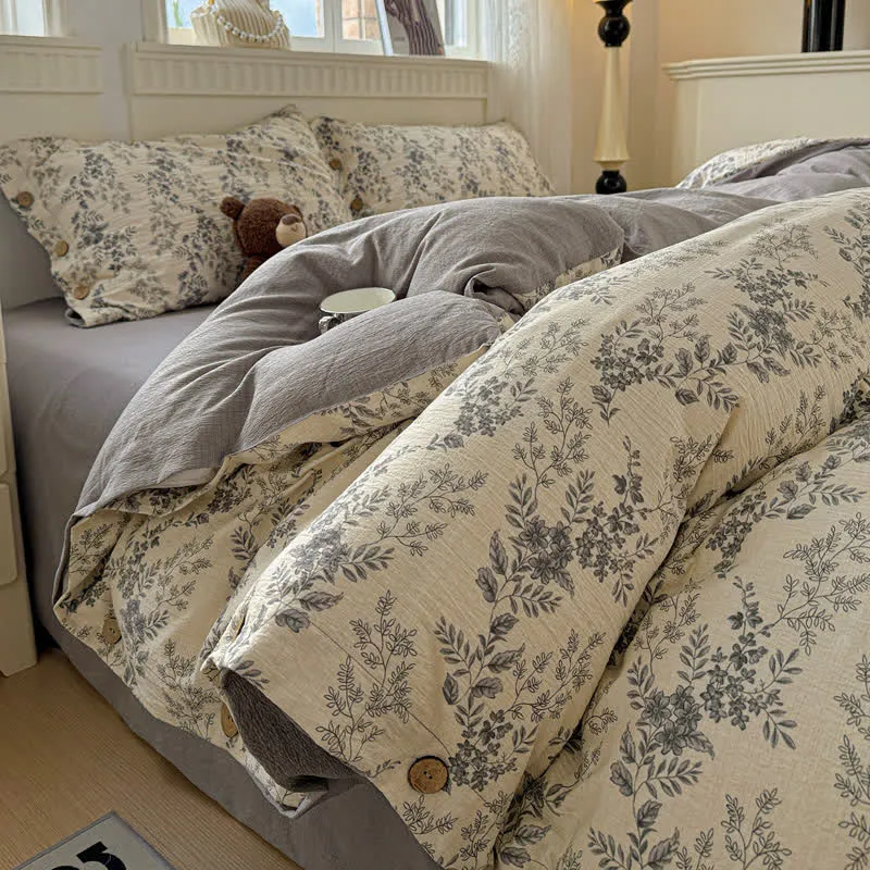 Elegante set di biancheria da letto con motivo floreale a foglie