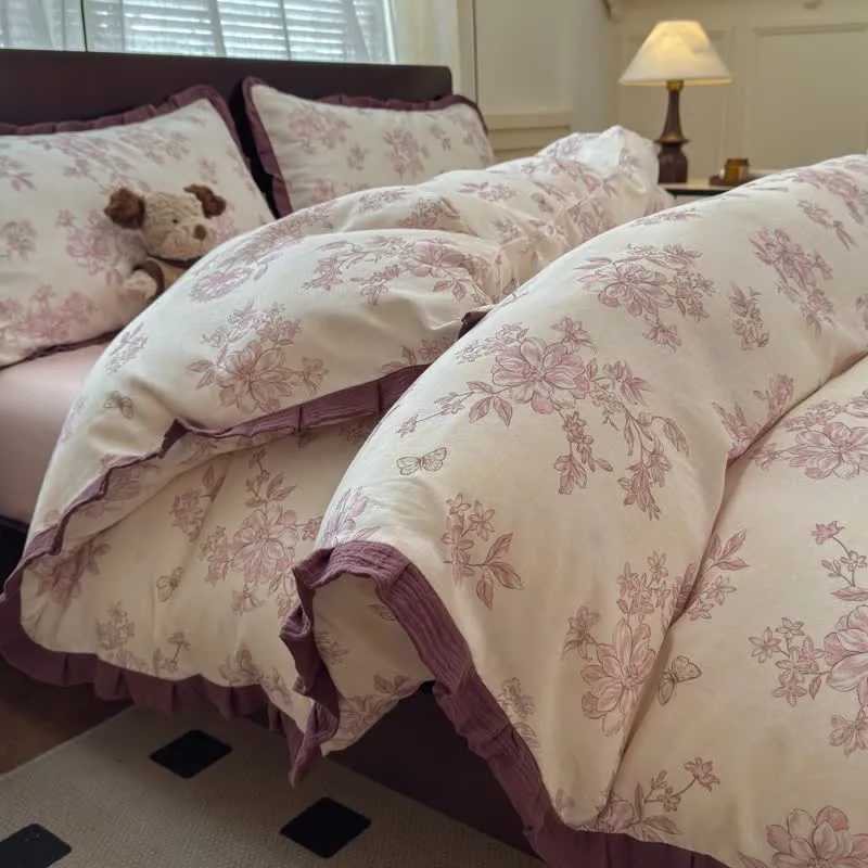 Elegante set di biancheria da letto in cotone con volant floreali