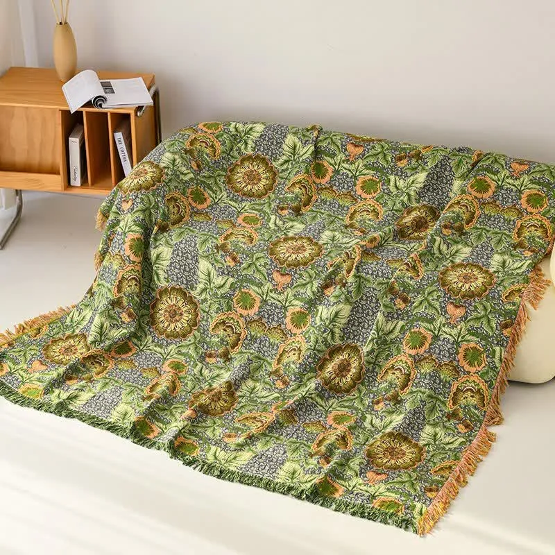 Coperta in garza di cotone con nappe e motivo floreale ispirato al giardino