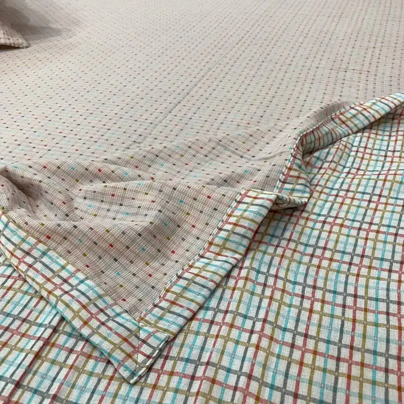 Copriletto reversibile in cotone a quadretti colorati