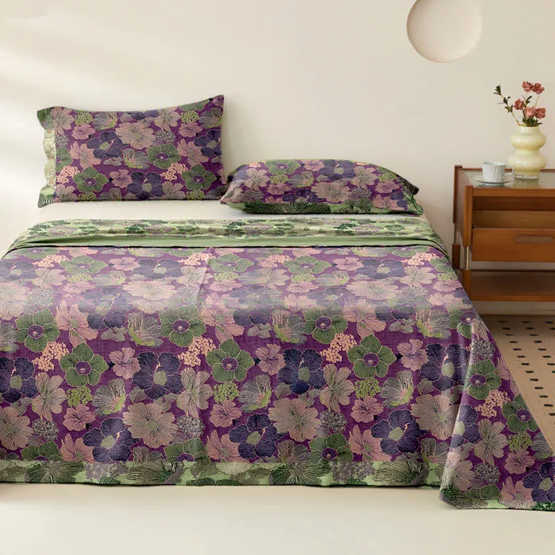 Copriletto in garza di cotone jacquard con fiori di pesco