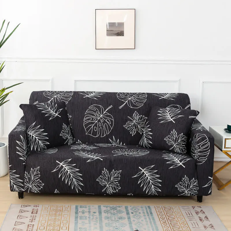 Copridivano elasticizzato con stampa Monstera nera