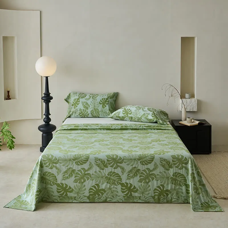 Copriletto in garza di cotone jacquard verde Monstera