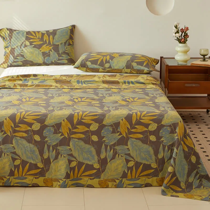 Copriletto reversibile in cotone a doppio strato tinto in filo jacquard