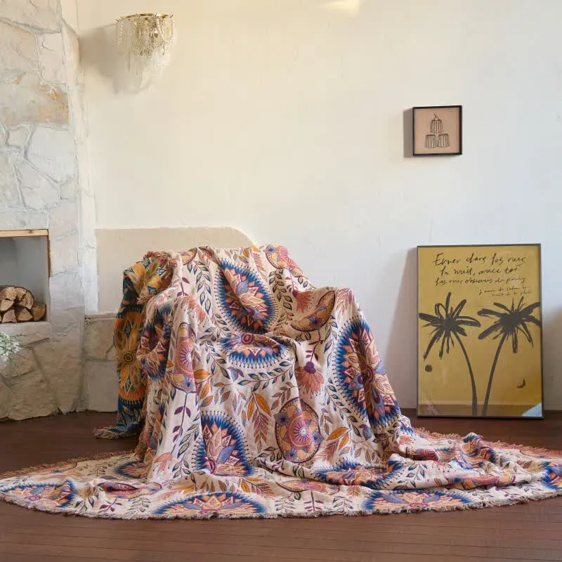 Coperta con nappe in cotone con medaglione floreale