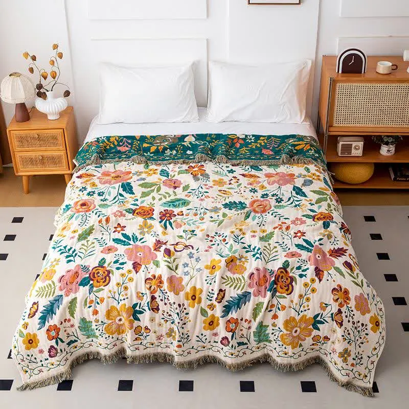 Trapunta in cotone con nappe e foglie colorate
