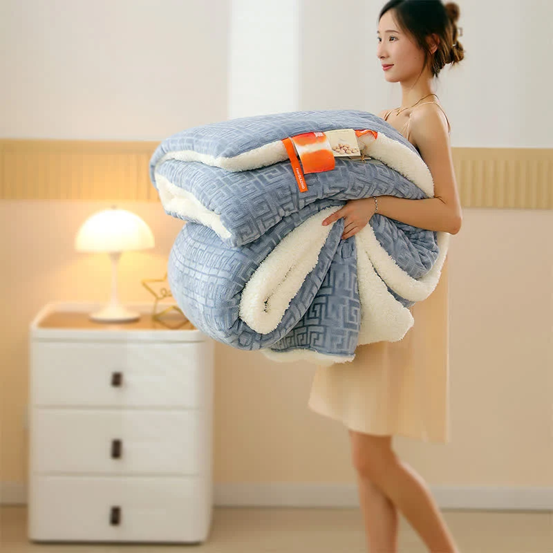 Coperta Sherpa con motivo geometrico in rilievo