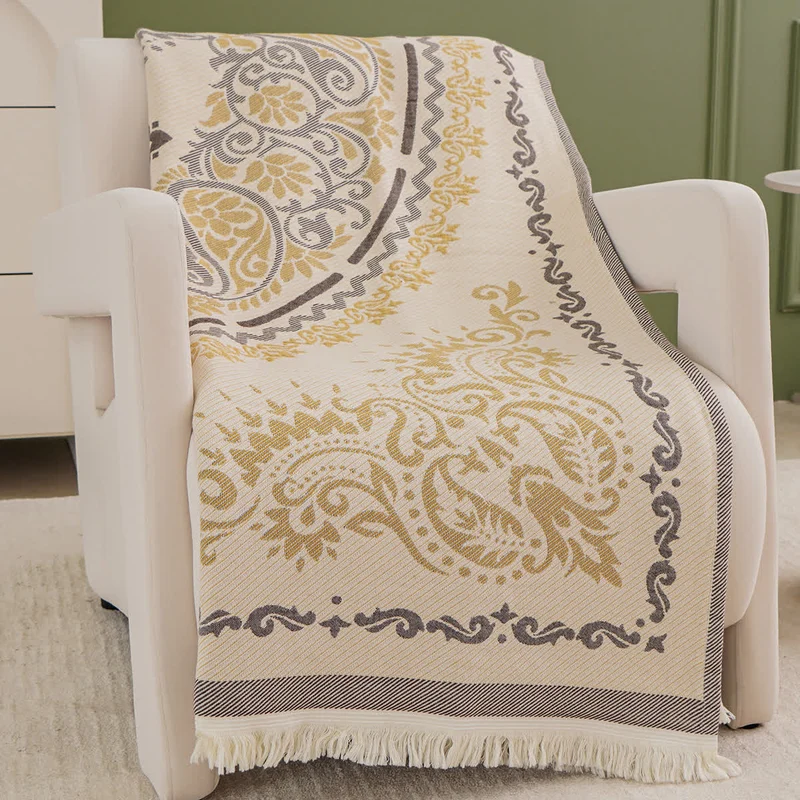 Coperta in garza di cotone leggera con motivo Paisley e nappa