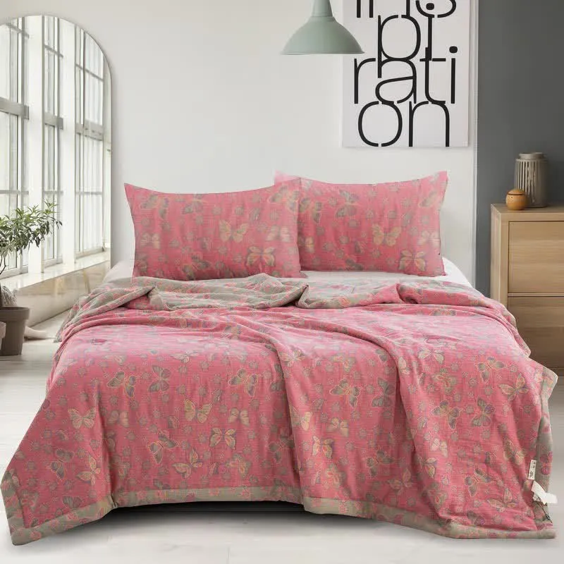 Trapunta jacquard in garza di cotone con farfalla rosa