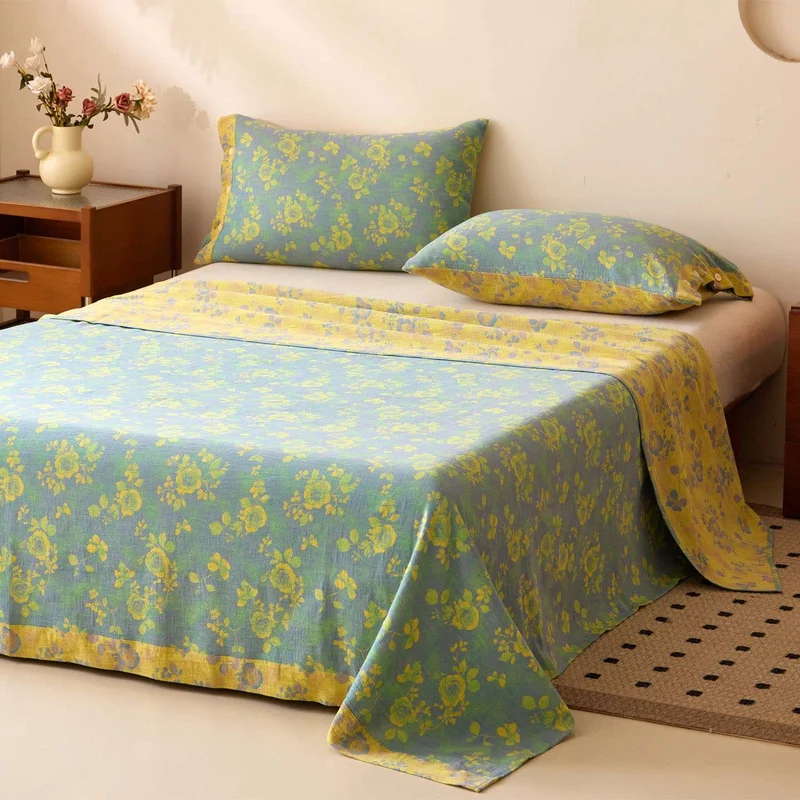 Copriletto in garza di cotone jacquard rosa