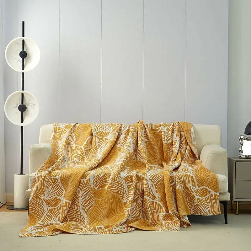 Coperta copridivano con foglie di platano