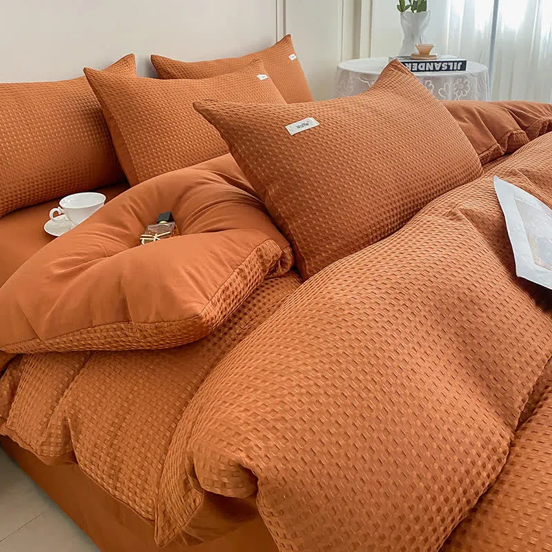 Set di biancheria da letto in tinta unita con trama a nido d'ape (4 pezzi)