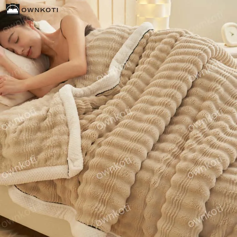 Coperta in pile con trama a onde jacquard